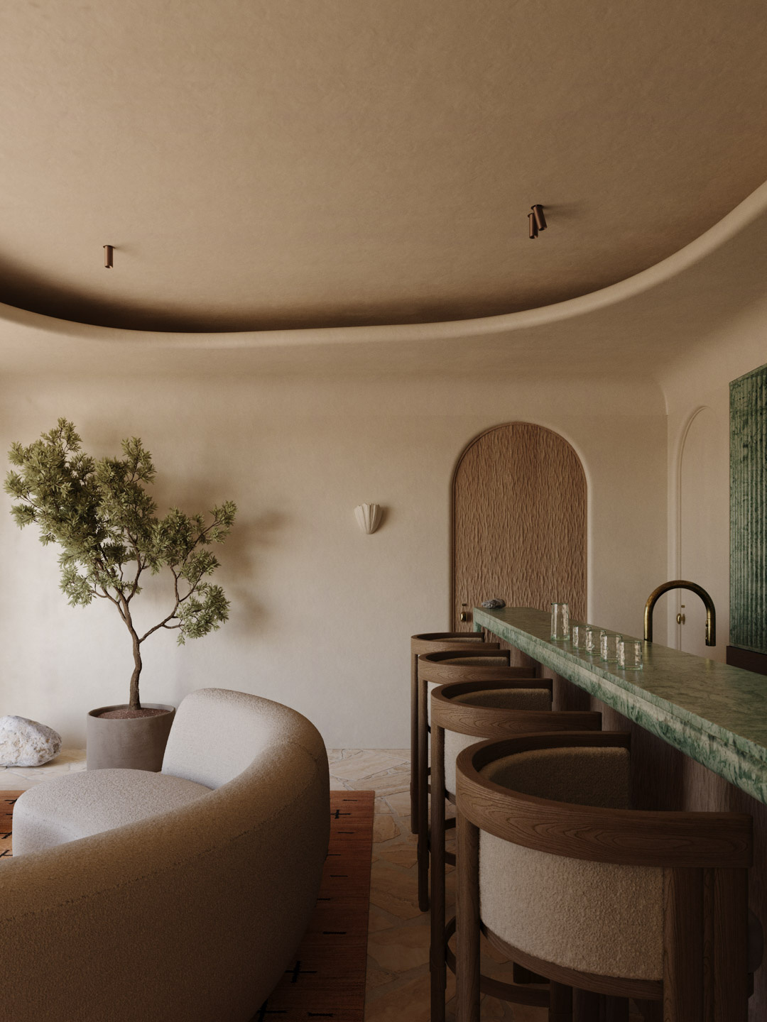 elegant interior featuring a curved boucle sofa, minimalist potted tree, and a green marble bar with four wooden bar stools, set against a softly textured wall with arched detailing and natural stone flooring in a warm, earthy palette.